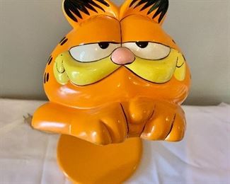 $30; Garfield metallic lamp in working condition; adjustable; 8 in. (diameter, base) x 18 in. (H, maximum height when fully expanded) x 8 in. (W, head)