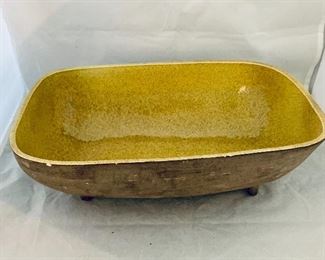 $25; Glazed ceramic four-footed rectangular loaf bowl, signed Milli Hunter and Boote Erlandson on base; 4 1/2 in. (H) x 14 in. (L) x 9 in. (W); as is with repairs to three feet