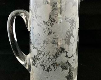 $20; Hand etched crystal pitcher; 8 1/2 in. (H) x 5in. (base, diameter); "1878" and "JK" initials 