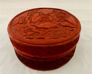 $30; Carved cinnabar, round, and covered wooden box; 1 3/4 in. (H) x 4 in. (diameter)
