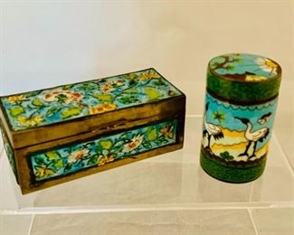 $20 each; Handpainted rectangular box; 1 1/4 in. (H) x 3 1/4 in. (L) x 1 1/2 in. (W); painted circular covered container; 2 in. (H) x 1 in. (diameter)