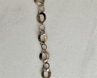 $35: 950 Silver bracelet; 8" long, 0.75" wide 