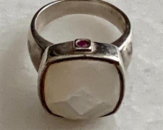 $40; Sterling silver Elle ring with cushion shaped faceted iridescent stone.  Approx size 5