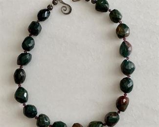 $75; Faceted stone necklace with sterling silver clasp; 19" long