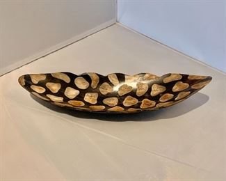 $20; Decorative dish with dots, possibly made from horn; 12" x 4" 