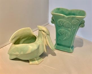 $30; NM pelican planter (SOLD) : 5.5" H x 7.5" W x 4.5" D and $25; green glazed vase with scroll marked "USA" (right): 7.25" H x 5.25" W x 3.5" D