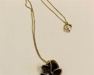 $75; Angela Cummings Sterling Silver floral necklace on 18”box chain.