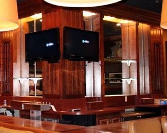 L-Shaped Lighted Back Bar With Mirrored Displays, Glass Shelving And Metal Wine Racks, Approx 11ft Tall(floor to ceiling) 12ft x 10ft