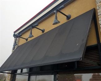 Metal Framed Awnings With Black Canvas Shades Total Qty 4, Two Are 69in Tall x 37in Deep x 196in Long And Two Are 69in x 37in x 99in