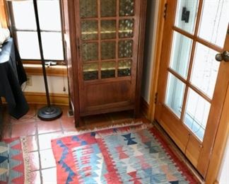 Bottle Glass Cabinet and Turkish Rugs