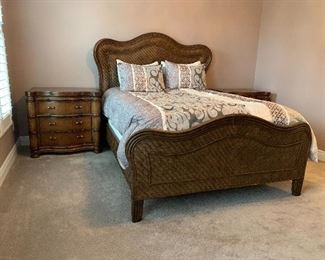 7. Queen Size bed with a wicker design wood Head and Foot Board. Mattress and bedding included $325 Nightstands sold separately