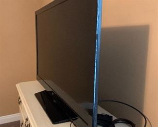 13. Westinghouse Flat Screen 46" TV free standing.  Works great, with remote! $125