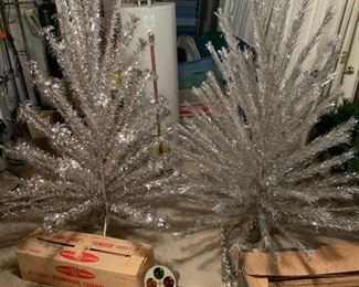 6 1/2 foot mid century modern Royal Pine aluminum tree with lighted rotating base. 6 1/2 ft Craft House aluminum Christmas tree. Other assortment of color wheels and rotating Christmas tree base

