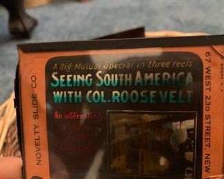 Dozens of glass slides, many with old movie stars on them