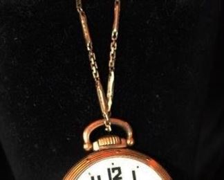 Gold pocket watch