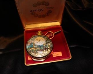 Arnex musical mechanical gold pocket watch with moving face