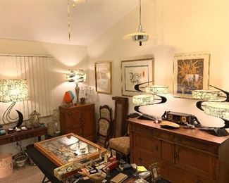 Mid century room with fantastic lighting and art. Chagall