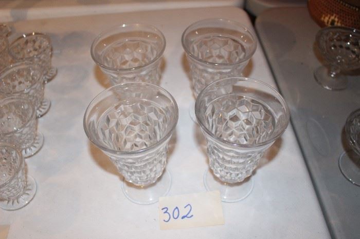 302 - Four tall glasses Now $15.  Was $24. Fostoria American