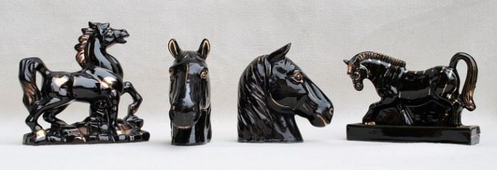 $40 Left: Black ceramic prancing horse, with gold trim.  W: 8" | H: 8" | D: 2.5"
$25 each Center: 2  Black ceramic horseheads with gold trim.  W: 6" | H: 6.5" | D: 2.5"
Right: Black ceramic zebra planter, w/ gold trim | W: 9" | H: 6" | D: 3.5" |  AS IS: Small crack at bottom of base [Bin 41]