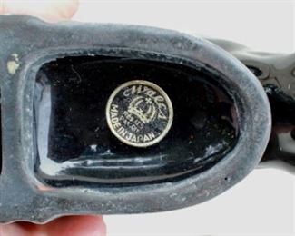 $25 Detail: Black ceramic horsehead with gold trim