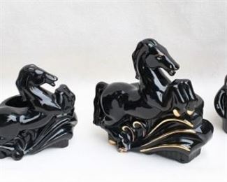 $30 each Right: Black ceramic leaping horse planter, with gold trim (shown front and back).  W: 10" | H: 9.5" | D: 6"  - 4 available
Left: Black ceramic leaping horse planter.  W: 8" | H: 8" | D: 5.5" - 4 available [Bin 42] 
