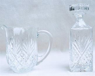 $20 Right: Pressed glass square decanter.  W: 3.5" | H: 10.5" | D: 3.5".  Matches pressed glass round pitcher  - 2 available
$20 Left: Pressed glass round pitcher.  L: 9" | H: 8" |  diameter: 6".   Matches pressed glass square decanter - 2 available [Bin 40] 