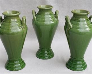 $30 each - Green ceramic vases, two ceramic handles, slightly crackled glaze.  H: 12.5" | diameter: 6.5" - 2 available [Props]