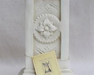 $50 Pedestal: Antiqued off-white cast resin, square, raised floral design.  W: 7" | H: 13.5" | D: 7" [Props]