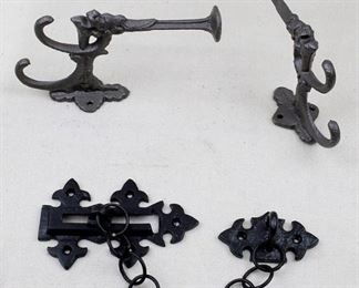$25 .  W: 2" | H: 7" | D: 4"UPPER SOLD
$40 Lower: AVAILABLE Ornate metal door chain, cast black metal w/ holes for affixing to door and doorjamb, reproduction.  H: 3" | D: 1.5" | chain: 9" [Bin 37] 