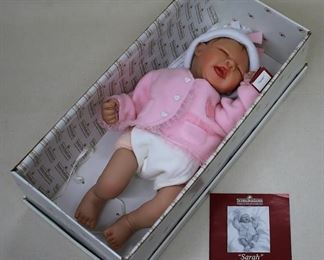 $30 "Sarah" by Ashton-Drake Galleries - Lifelike newborn doll w/ pink onesie, jacket & hat, in box, w/ brochure.  L: 17" [Bin 32a] 