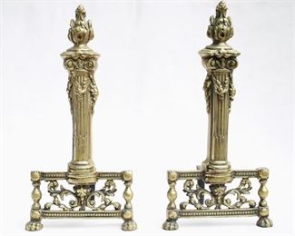 $120 - Set of 2 andirons: Cast brass, torch design.  W: 8" | H: 16" | D: 8.5" [Props] 