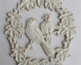 $40 - Cast metal wall plaque, painted white, love birds in wreath, hole for hanging.  W: 7.5" | H: 9" | D: 0.5" [Bin 25]