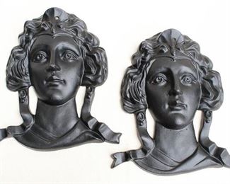 $60 each -  Black cast metal wall plaques, female heads in Beaux Arts style, hole for hanging.  W: 12" | H: 14" | D: 3"  - 2 available [Bin 24]