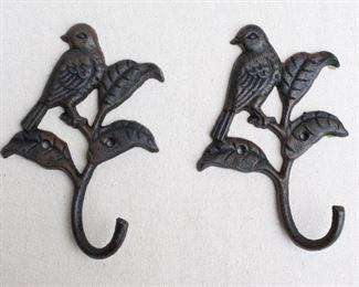 $50 - Set of 2 black cast metal wall hooks, bird on branch, 2 holes for hanging.  W: 4.5" | H: 7" | D: 1.5" [Bin 24]