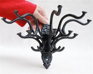 $40 -Black cast metal wall hook, reproduction Victorian, 5 adjustable triple hooks, 2 holes for hanging.  W: 12" | H: 6.5" | D: 6.5" [Bin 24] 