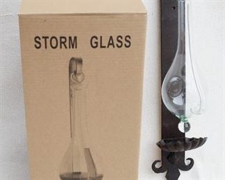 $20 - Storm glass of blown glass, in box, extra handmade metal wall hanger w/ 2 holes for hanging.  W: 3" | H: 17.5" | D: 3" [Bin 24] 