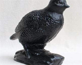 $50 - Black cast metal bird figure.  L: 8" | W: 4.5" | H: 7.5" [Bin 24]
