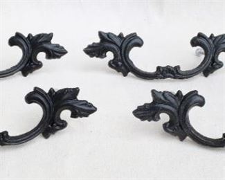 $40 - Set of 4 black cast metal drawer pulls, stylized foliage.  W: 7" | H: 2" | D: 1" | Spacing between screws: 4"  [Bin 24] 