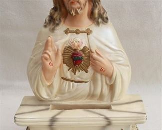 $24 - Sacred Heart bust on pedestal labeled "God Bless Our Home," painted plaster, electrified for Xmas tree bulb, 6' electric cord . Pacini Novelty Company, Detroit.  W: 11" | H: 16" | D: 4.5"