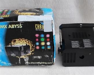 $200 - Light projector, black metal w/ ceiling hanger, 9 settings for light patterns, electric cord, for indoor use only.  Chauvet Lighting, DMX-450 Abyss.  W: 10.5" | H: 9.5" | D: 10.5" 