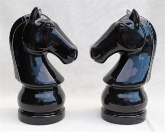 $20 - Pair black ceramic horseheads (like knights on a chessboard).  Each L: 8" | W: 6" | H: 13" [Bin 19] 