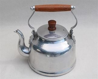 $20 - Tea kettle, chrome w/ wooden knob & handle, holds 3pts (?).  L: 9" | H: 9.5" | D: 6.5" [Bin 18] 