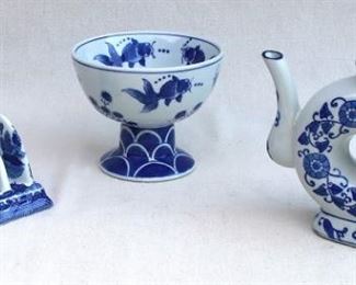 $20 - Blue & white Chinese ceramic toast rack, willow pattern. Brand new.  L: 5.5" | W: 3.5" | H: 3.5"
$20 - Blue & white Chinese ceramic footed bowl, koi decoration. SOLD .  H: 4.5" | diameter: 7.2" [Bin 17] 
$20 - - Blue & white Chinese ceramic donut tea pot. Brand new.  L: 7.5" | H: 7" | D: 2"