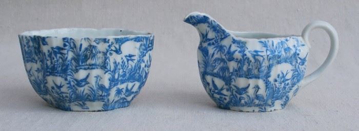 $30 - Porcelain creamer and sugar bowl, white w/ blue swallow design inspired by willow ware.  W: 4" | H: 2.5" | D: 3" [Bin 17] 