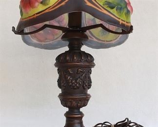 $120 - Table lamp, cast metal, bronze finish, for single bulb, floral-painted glass globe w/ 5 bosses, 6' cord w/ on-off switch.  W: 15" | H: 18.5" | D: 15" | base diameter: 7"