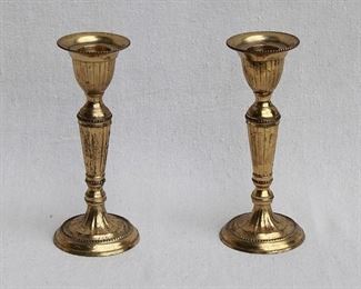 $20 - Pair brass candlesticks.  H: 6"  | base diameter: 2.5" [Bin 15]  