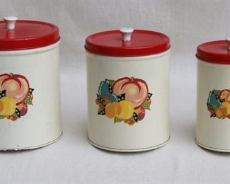 $30 - Vintage canister set of 3 canisters, white w/ fruit decoration, red lids w/ white knobs.  H: 7.5" | diameter of largest: 6" [Bin 12C] 