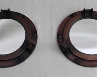 $20 - Pair of round mirrors, porthole-styled frames, antiqued bronze finish.  D: 2.5" | mirror diameter: 5.5" | outside diameter 9" [Bin 11B] 