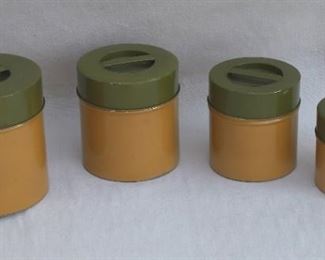 $35 -1970s set of 4 metal canisters, ochre and olive.  [Bin 10B] 