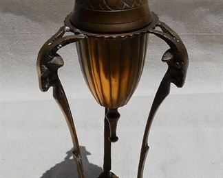 $40 - Incense burner, bronze, lidded egg shape on 3 stylized rams.  H: 12" | D: 4.75" [Props] 